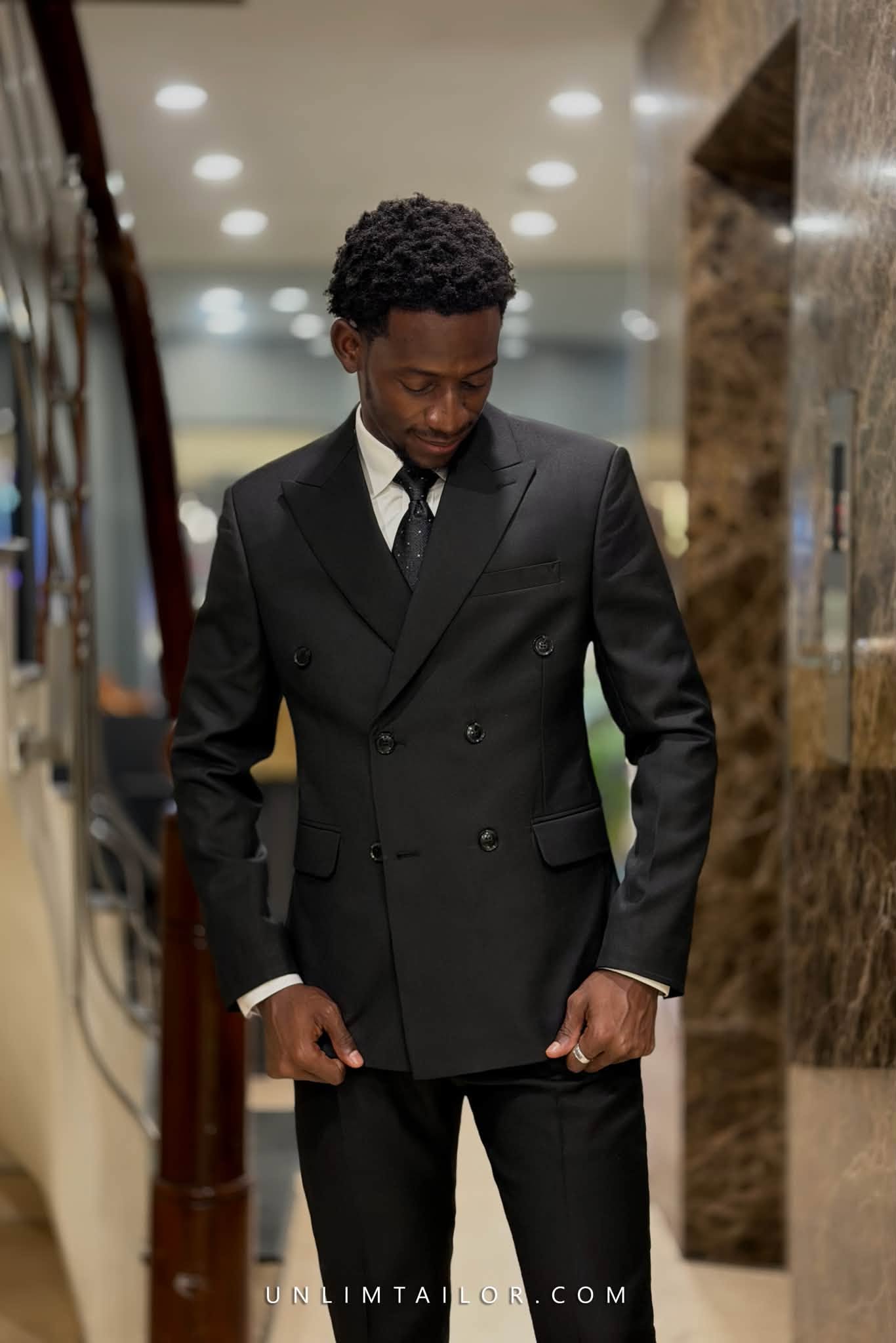 A mysterious black two-piece suit, double-breasted in style, tailored by Unlim Tailor in Hanoi. - detail images